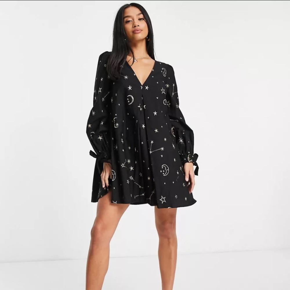 ASOS DESIGN Petite trapeze mini dress in star and moon embroidery in black